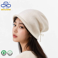 Gorro de punto suave y moderno para mujer, con cordón ajustable en la espalda, para clima frío, color crema, con borde enrollado, proveedor ODM OEM