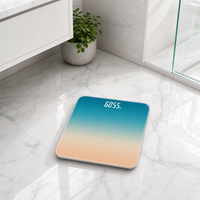 Balance numérique moderne à dégradé bleu-orange avec écran LED dissimulé en verre trempé pour un système de pesée personnel précis à domicile