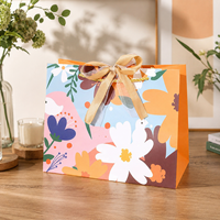 Sacs cadeaux en papier à motifs en stock avec nœud en ruban – Emballages de luxe pour boutiques, cadeaux, mariages et fêtes