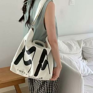 Sac bandoulière en toile grande capacité, double compartiment, personnalisable avec logo et lettres imprimées, élégant et polyvalent - Product Image 4