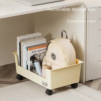 Organisateur de livres et de sacs à dos moderne sous table, solution de rangement mobile à roulettes pour dortoirs d'étudiants et salons