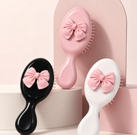 Peigne à coussin d'air mini en forme de nœud pour filles, portable, lissant, format voyage, pour l'exportation