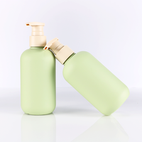100ml 200ml 300ml 500ml ensembles de bouteilles de lotion PE-HD en plastique vert bouteille de lotion de douche d'émulsion de presse de shampooing vide personnalisée