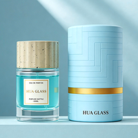 Premium Bestseller 50ml Transparente Glas-Parfümflasche Runde Leere Duftflasche mit Betonstruktur-Verschluss Box-Verpackung
