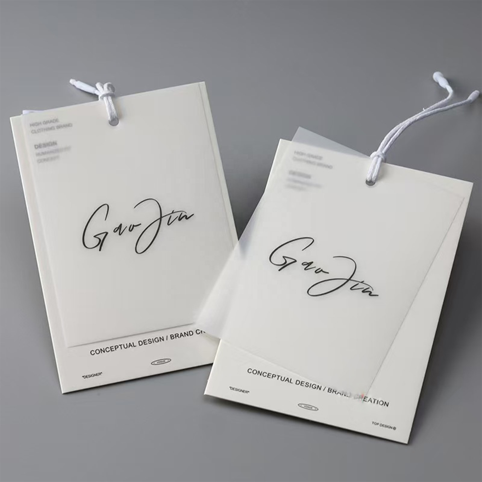 Custom Logo Clothing Tag Clear PVC Hang Tag 600gsm Paper With Transparent Plastic Hang Tag String For Clothing Hangtags