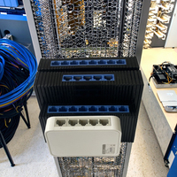 Gran oferta, usado conmutador de red de 10/100Mbps con 2 puertos y 5 puertos de 1/2 Mbps con SNMP QoS para aplicaciones de barra de Internet y cámara IP