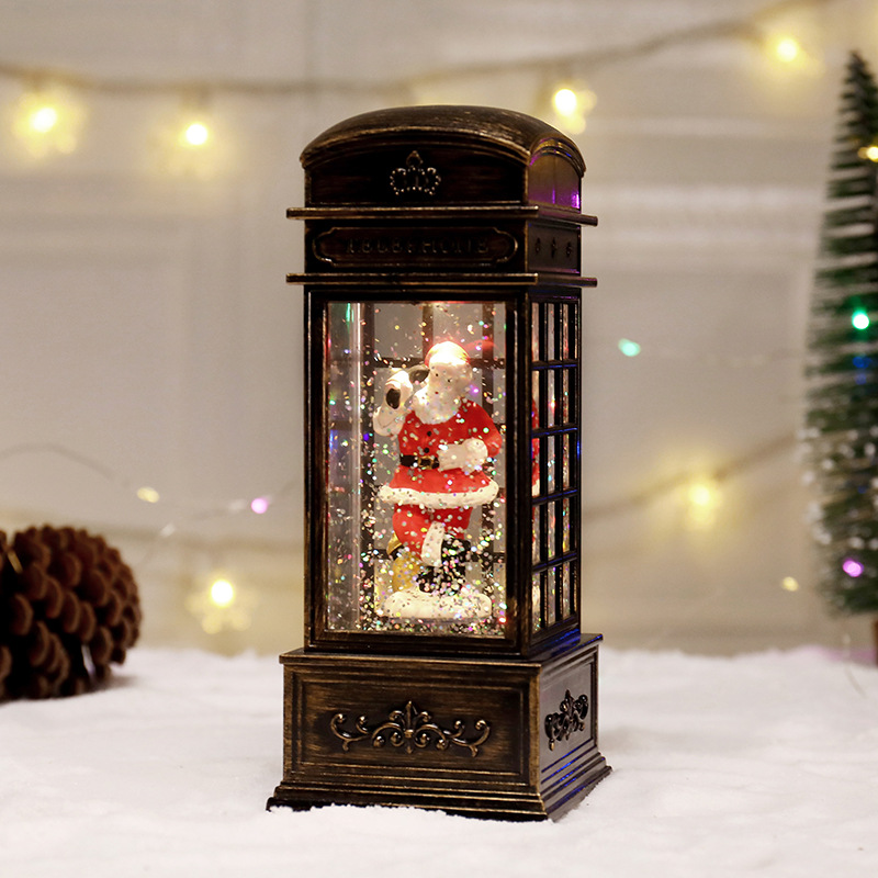 Papá Noel chapado en oro en el teléfono