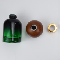 Vente chaude usine – Bouteille diffuseur à roseaux ronde en verre de luxe personnalisée 100ml 150ml 200ml pour huiles essentielles et parfums, avec logo personnalisé