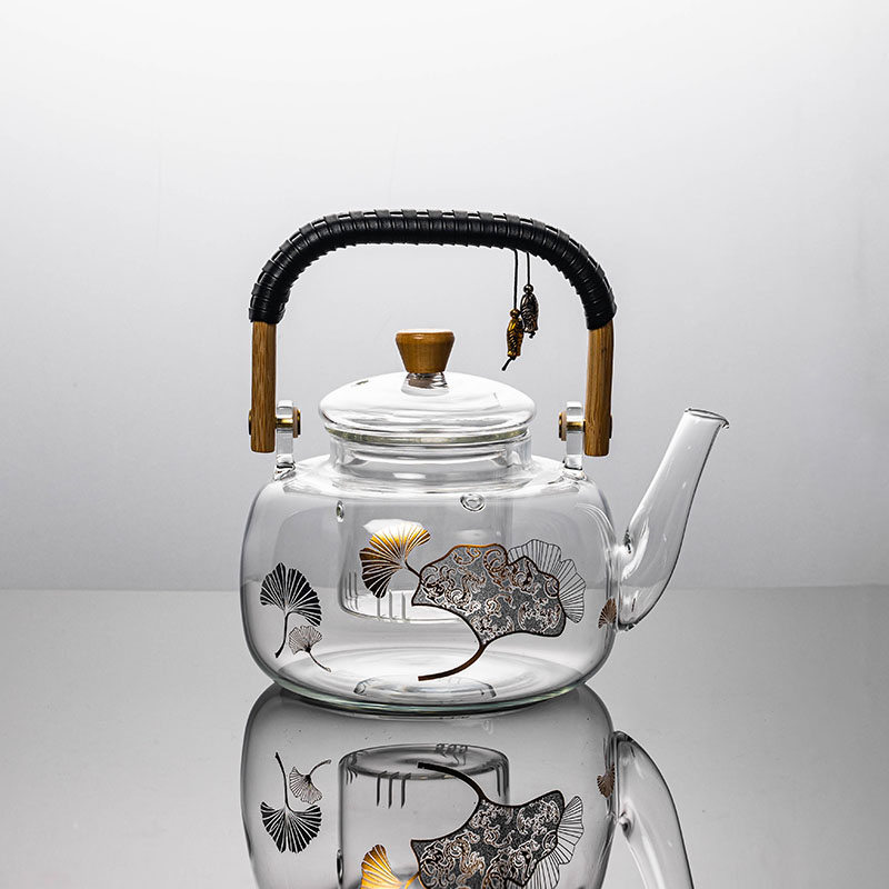 Engraved gold fish-shaped pot