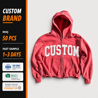 Hoodie streetwear personnalisé, coupé et cousu, zippé, avec appliqué, broderie effet vieilli et patch, délavé à l'acide