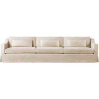 Canapé sectionnel minimaliste classique à accoudoirs inclinés, rembourré en tissu, avec coussins, pour hôtel, villa, design éco-responsable, mobilier