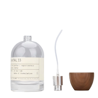 Flacon pulvérisateur de parfum rond en verre transparent rechargeable avec bouchon en bois 30ml/50ml/100ml pour emballage cosmétique et parfum, OEM/ODM disponible