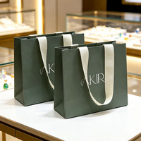 Sac cadeau de luxe personnalisé pour bijoux, en papier couché avec poignée, vente en gros pour emballage de bijoux, boutiques et marques de détail
