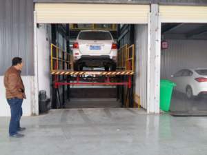 Elevador de carga industrial hidráulico certificado CE Zhongxiang 3T-5T Capacidad Mesa personalizada y altura de elevación de 3m/5M - Product Image 4