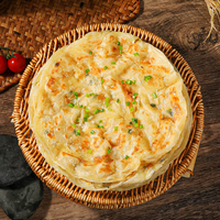 Crêpes chinoises traditionnelles faites à la main, surgelées pour conserver la fraîcheur. Pâtés aux oignons verts en sachet pour enfants, collations rapides