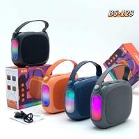 Haut-parleur portable sans fil en tissu BS-128 en gros avec fonctions radio FM/TF/USB/TWS, woofer stéréo, super basses et haut-parleur Bluetooth puissant