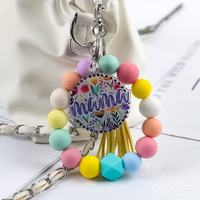 Nouveauté 2026 : Porte-clés en silicone perlé style mignon, avec pompon en PU hexagonal, pour bracelets et porte-clés – Vente en gros