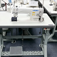 Machine à coudre industrielle à point noué à aiguille simple DDL-8700-7 d'occasion