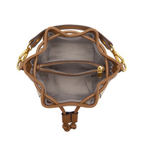 Bolso de cubo pequeño de cuero con cordón y empalmes, para mujer, nueva moda, estilo popular en redes, con un toque de sofisticación y exclusividad, tipo bandolera