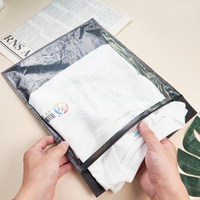 Sac à glissière en plastique écologique noir, emballage en poly rangement transparent non tissé, sac à glissière pour t-shirt