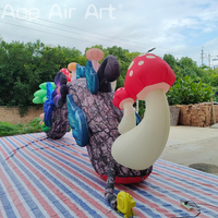 Accessoires de scène personnalisés, arche gonflable pour parc d'attractions avec décoration de champignons, fleurs, papillons et pays féerique