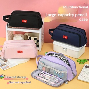 Nouvelle trousse à crayons en tissu transfrontalière, double couche, multifonctionnelle, boîte à papeterie simple, style coréen, sac à crayons créatif - Product Image 1
