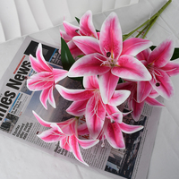 Arrangement de lys blanc rose réaliste 55cm fleurs artificielles à tige métallique pour la décoration de café d'Asie du Sud-Est Moyen-Orient