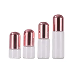 Flacon d'échantillon à rouleau d'huile essentielle de parfum en verre transparent de 1ml 2ml 3ml 5ml avec capuchon dôme en or rose