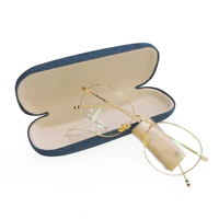 Vente en gros usine : Étui rigide en fer pour lunettes optiques en PU, motif uni, violet et bleu, tendance, avec logo personnalisé, pour lunettes de soleil, 90g