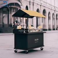 Chariot de café de rue mobile à 4 roues en fer, design moderne, personnalisable et amovible, pour la vente de bubble tea et de desserts