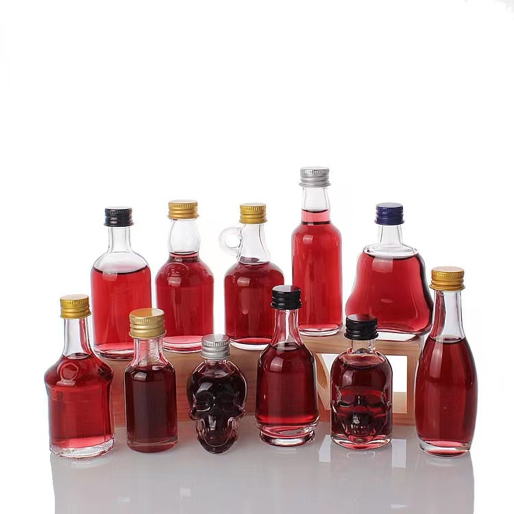 Vente en gros 30ml 40ml 50ml 100ml Mini bouteille miniature en verre de jus de vin de spiritueux pour whisky vodka