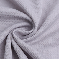 100% polyester 75D/36F tricoté tissu oeil d'oiseau maille Jacquard à séchage rapide pour T-shirts uniformes de balle PU imperméable pour auvents