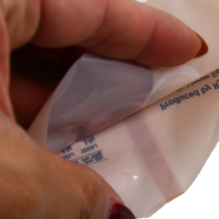 Sacs d'emballage transparents brillants scellés sur le dos, personnalisés pour biscuits, noix, bonbons et graines de melon.
