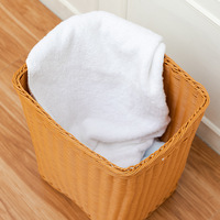 Panier à linge moderne en PP tressé à la main, spacieux et facile à transporter, idéal pour la salle de bain et la buanderie