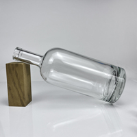 Bouteille en verre ovale transparente vide en gros, forme pilule, avec bouchon en liège en bois pour emballage cadeau de whisky et de liqueur