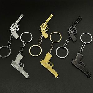 พวงกุญแจปืนจำลองคุณภาพสูง ผลิตจากโลหะผสมสังกะสีขนาดเล็ก เหมาะสำหรับเป็นของขวัญส่งเสริมการขาย - Product Image 1