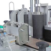 Machine d'étiquetage automatique à double tête pour bouteilles rondes, pour l'étiquetage du corps et du col des bouteilles cylindriques
