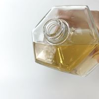 Bouteille à liqueur en verre épais à 6 bords avec bouchon à vis