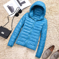 Veste d'hiver légère en duvet pour femme avec capuche coupe-vent ultra-légère