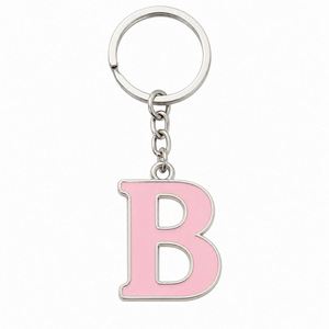 <b>Wholesale</b> Custom <b>Letter</b> Enamel Chain Simple Alphabet Key Ring Fashion Trend Jewelry Accessory Shop Metal <b>Keychains</b> - Product Image 3