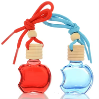 Désodorisant de voiture suspendu Diffuseur de parfum de voiture vide Bouteille en verre colorée en forme de pomme 8ml avec bouchon en bois