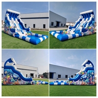Toboggan aquatique gonflable géant commercial en PVC robuste avec grande piscine à éclaboussures pour la location d'événements estivaux