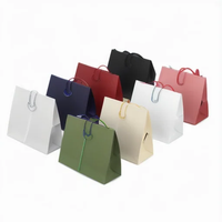 Sacs en papier biodégradables personnalisés de luxe avec votre propre logo pour vêtements, sacs d'emballage blancs mats pour boutiques, ruban