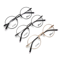 Montura redonda de gafas de titanio, hecha a medida, estilo retro, con 3 colores
