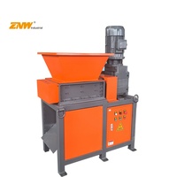 Déchiqueteuse multifonctionnelle de restes de textile de toutes sortes avec conception à double arbre et composants du noyau de la pompe à vendre