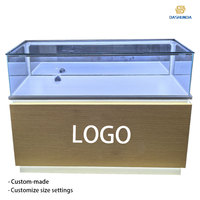 Support d'affichage pour téléphone portable en métal personnalisé, étanche, écologique, avec éclairage LED et vitrine en verre, pour produits électroniques