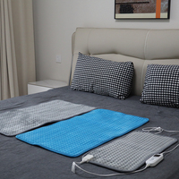 Couverture chauffante d'hiver électrique grise portable chaude avec coussin chauffant électrique à usage domestique