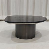 Table basse ovale en marbre noir avec base en acier inoxydable noir