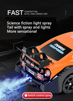 Simulación 2,4g tracción en las cuatro ruedas drift Racing spray niños competitivo control remoto coche de juguete Nissan GTR coche de control remoto