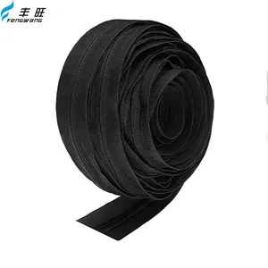 Guangzhou factory wholesale Nylon Coil Zipper By The Yard 3.3kg #5 Nylon 200m Zipper Roll For Sale